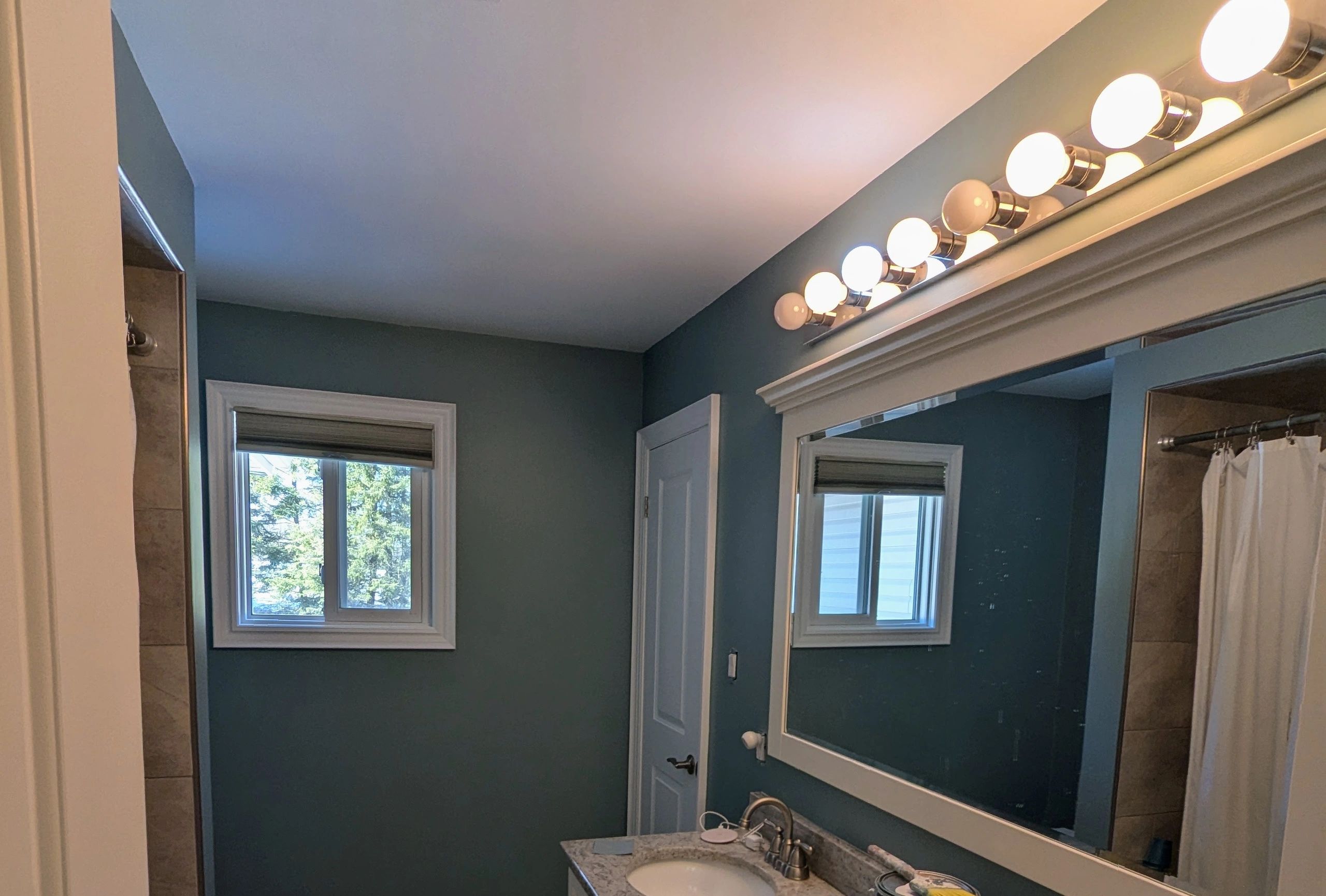 Finished bathroom painting project by 705 Painters